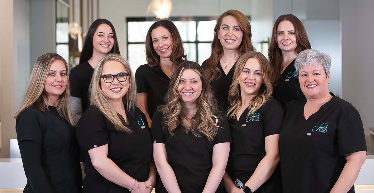 Group photo of the Smith Facial Plastics nurses and office team.